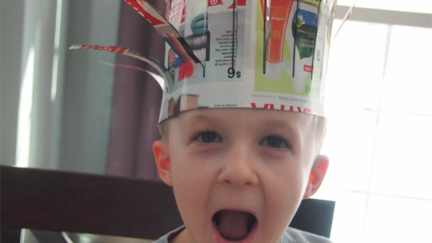 Kindergarten Cutting Activity -- Connor wearing his hat